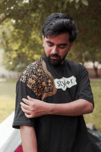 Bharosa – Oversized Beige Black T-Shirt with Large Screen Print