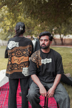 Bharosa – Oversized Beige Black T-Shirt with Large Screen Print